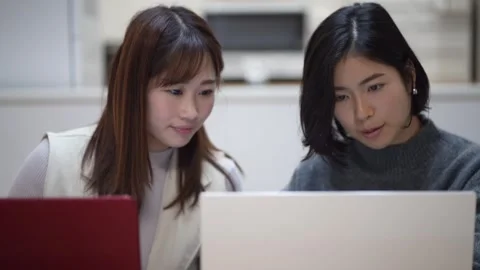 A woman learning how to use a computer. Stock Footage 332578535