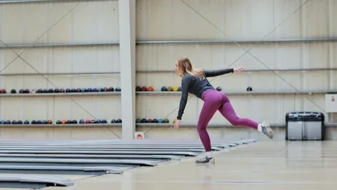 Woman Learns Bowling Pose Without Ball – Practice Movement in Training Hall Stock Footage 321717198