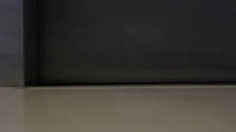 Woman leaves elevator 스톡 동영상 77101228