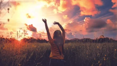 Woman Lifted Up With Arms In Praise And  