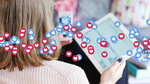 Woman lifting phone, code and hearts appearing, likes increasing, typing on Stock Footage 329701982