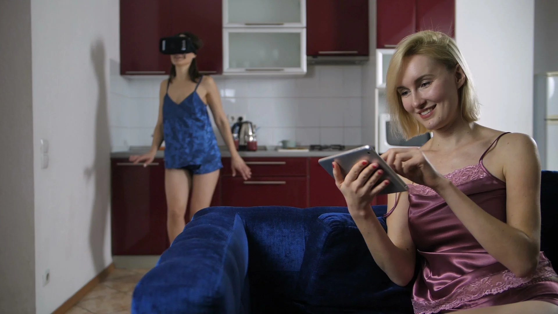 Woman in lingerie using virtual reality , Stock Video