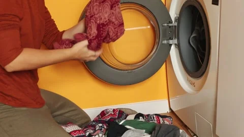 Woman Loading Washing Machine. Laundry Time-lapse. Fast Motion Laundry Load.. Stock Footage 319021061