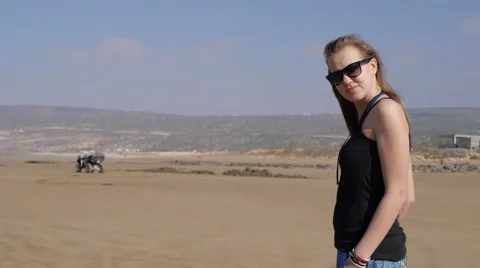 Woman looking at camera, desert, morocco Video stock 59790581