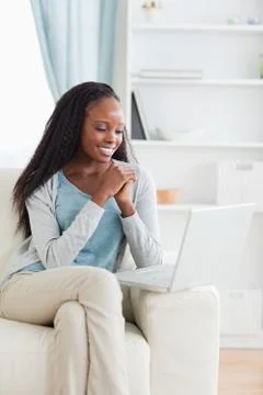 Woman looking at computer screen Stock Photos