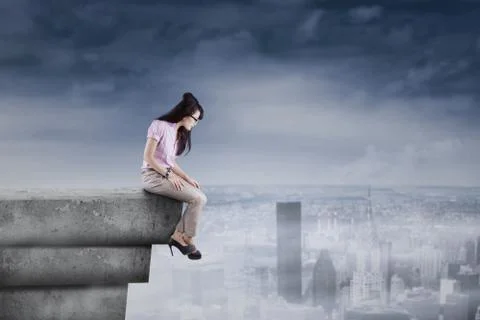 Woman looking down from the rooftop Stock Illustration