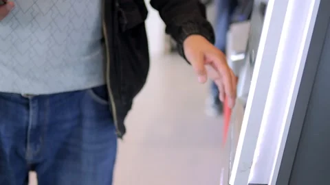 Woman is looking at her phone while holding a black purse Stock Footage 310712319