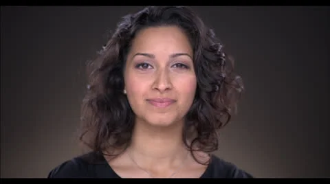 Woman looking up at lens Stock Footage 22487853