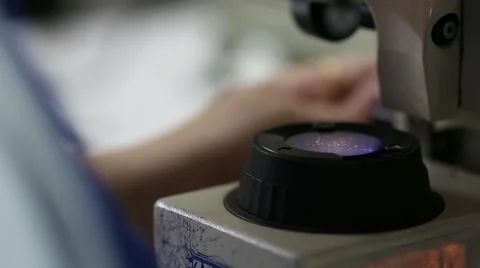 Woman looking into microscope 3 Video stock 41416054