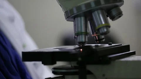 Woman looking into microscope 6 Video stock 41417427