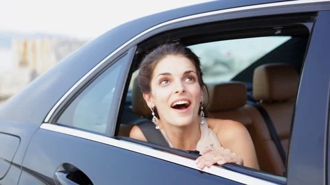 Woman looking out of car Stock Footage