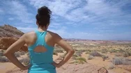 Woman Looking Out In Desert Valley Stock Footage