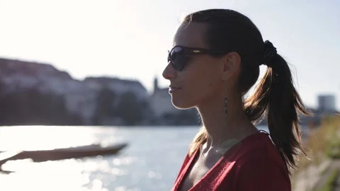 Woman looking at a river Stock Footage 86505258