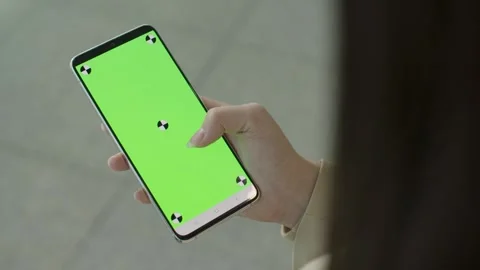 Woman looking at a smartphone Stock Footage 245653019