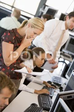 Woman Looking At Stock Reports Stock Photos