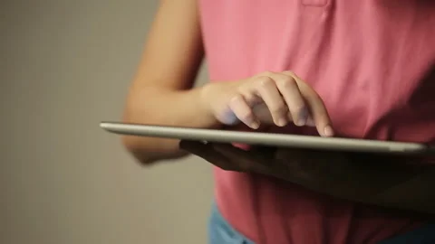 Woman looking at tablet computer Stock Footage 95355327