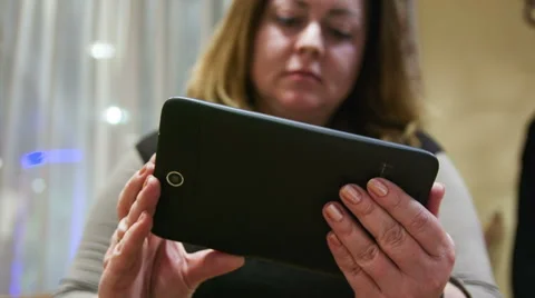 Woman looking at the tablet Stock Footage 44551293