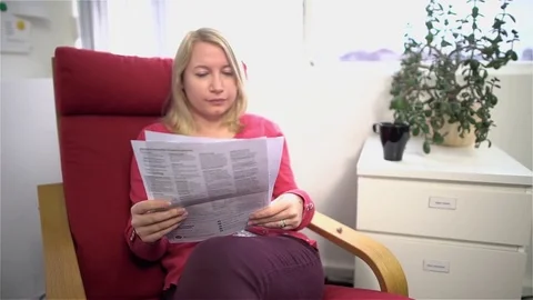 Woman Looking through Letters Stock Footage 73604697