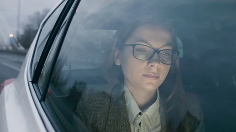 Woman Looking Through the Window in the Moving Car Stock Footage 84770788