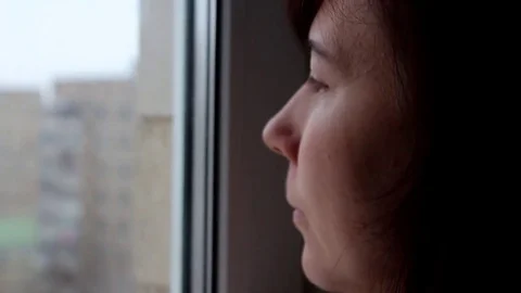 Woman looking in window drinking coffee Stock Footage 71832752