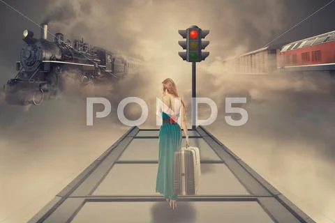Woman with luggage waiting train on the platform of railway station Stock Photos