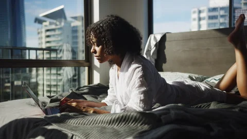 Woman Lying Bed and using Laptop Video stock 264221038