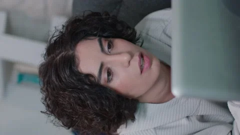 Woman lying on sofa and using laptop , freelance and remote working concept. Stock Footage 141122125