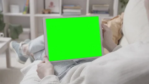 Woman Lying on Sofa with Tablet Computer in Hands Stock Footage 170510868