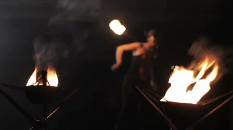 A woman  make a fire performance Stock Footage 45347182