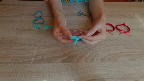 Woman Makes Bows Stock Footage 154896594
