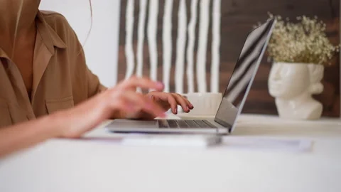 Woman makes calculations on numeric keypad at office 動画素材 165824612