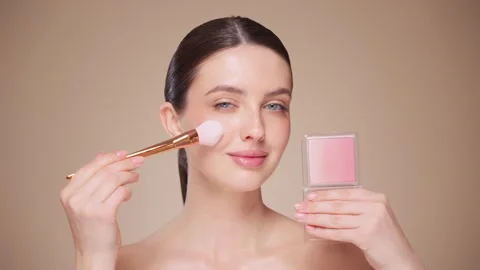 Woman makes makeup Stock Footage 312911791