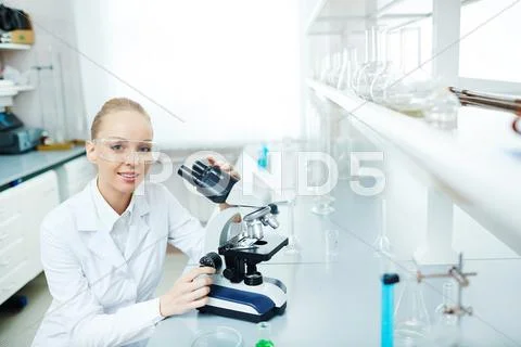Woman making biotechnological research in lab Stock Photos