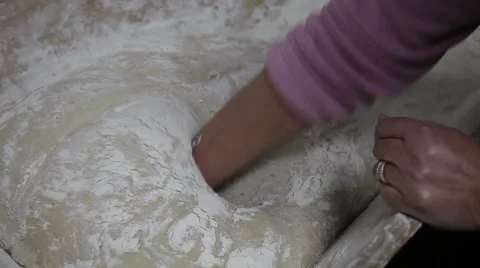 Woman making bread by hand traditionally Stock Footage 61712924