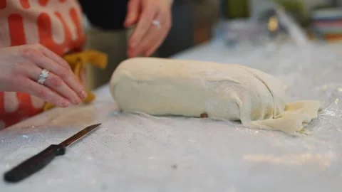 A woman is making a cake in a kitchen Video stock 295370322