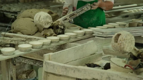 Woman making clay objects in pottery workshop. Handicraft and small business Stock Footage 194531049
