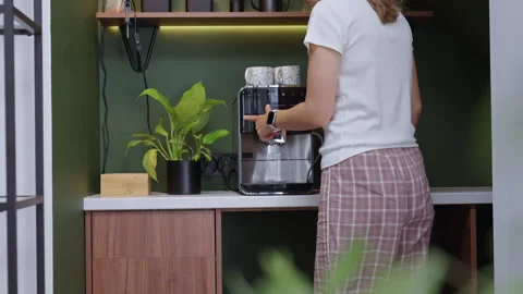 Woman making coffee with coffee machine at home coffee station Stock Footage 346003268