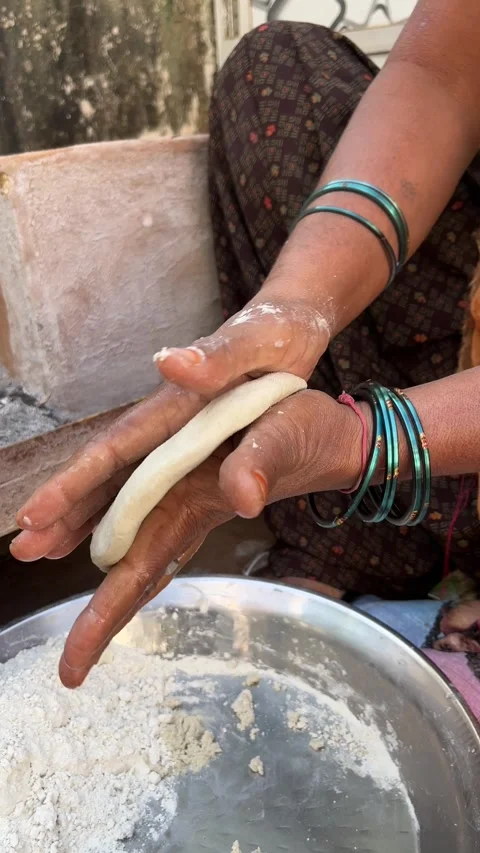 Woman Making Corn Flatbread by Hand in Traditional Style Stockbeeldmateriaal 320930880