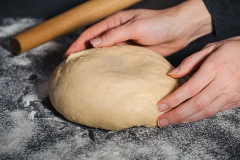 Woman making handmade dough for bread Stock Photos