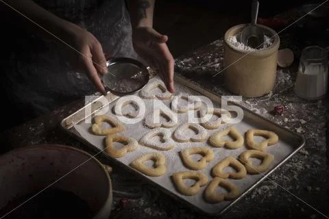Woman Making Heart Shaped Biscuits