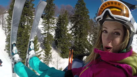Woman Making Jokes While She's On Ski Lift Stock Footage 139759545