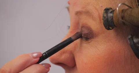Woman making make-up Stock Footage 145337562