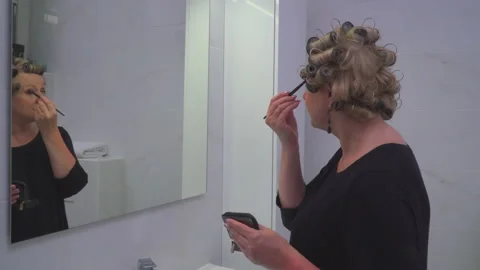 Woman making make-up Stock Footage 145788967