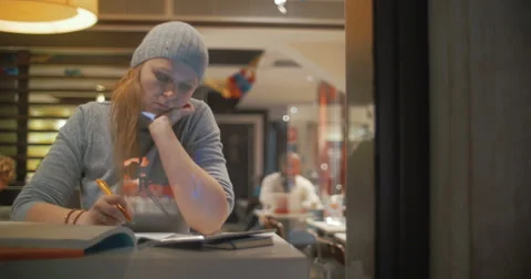 Woman Making Notes in Notebook Video stock 52016382