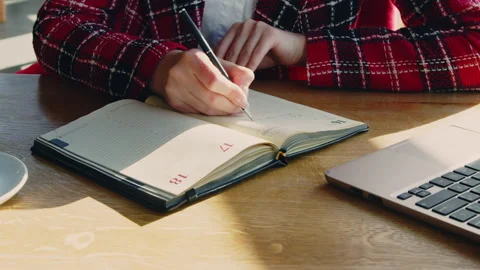 Woman Is Making Notes In Planner Stock Footage 169413282