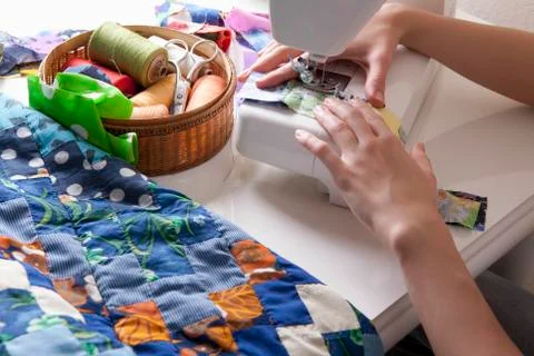 Woman Making Patchwork At Sewing Machine 스톡 사진