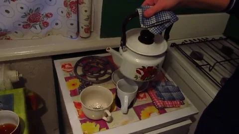 A woman is making tea Stock Footage 83247809