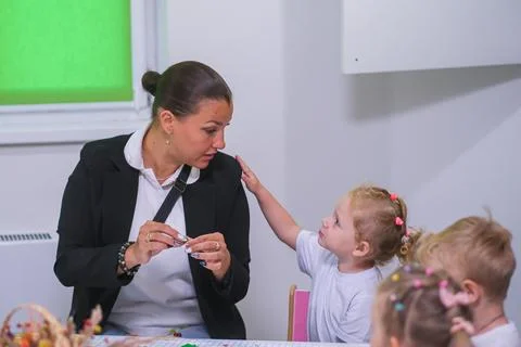 Woman manager looking down while working in office. Professional employee Stock Photos