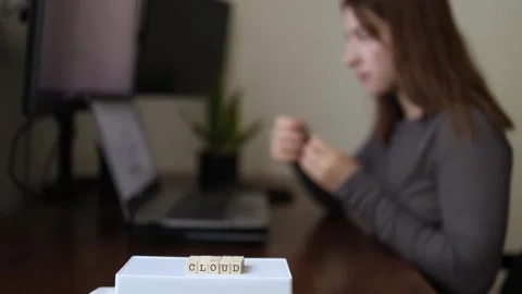 Woman managing cloud storage Stock Footage 337570797