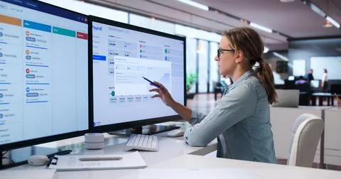 Woman Managing Payroll System On Computer To Process Employee Salaries Effici Stock Photos